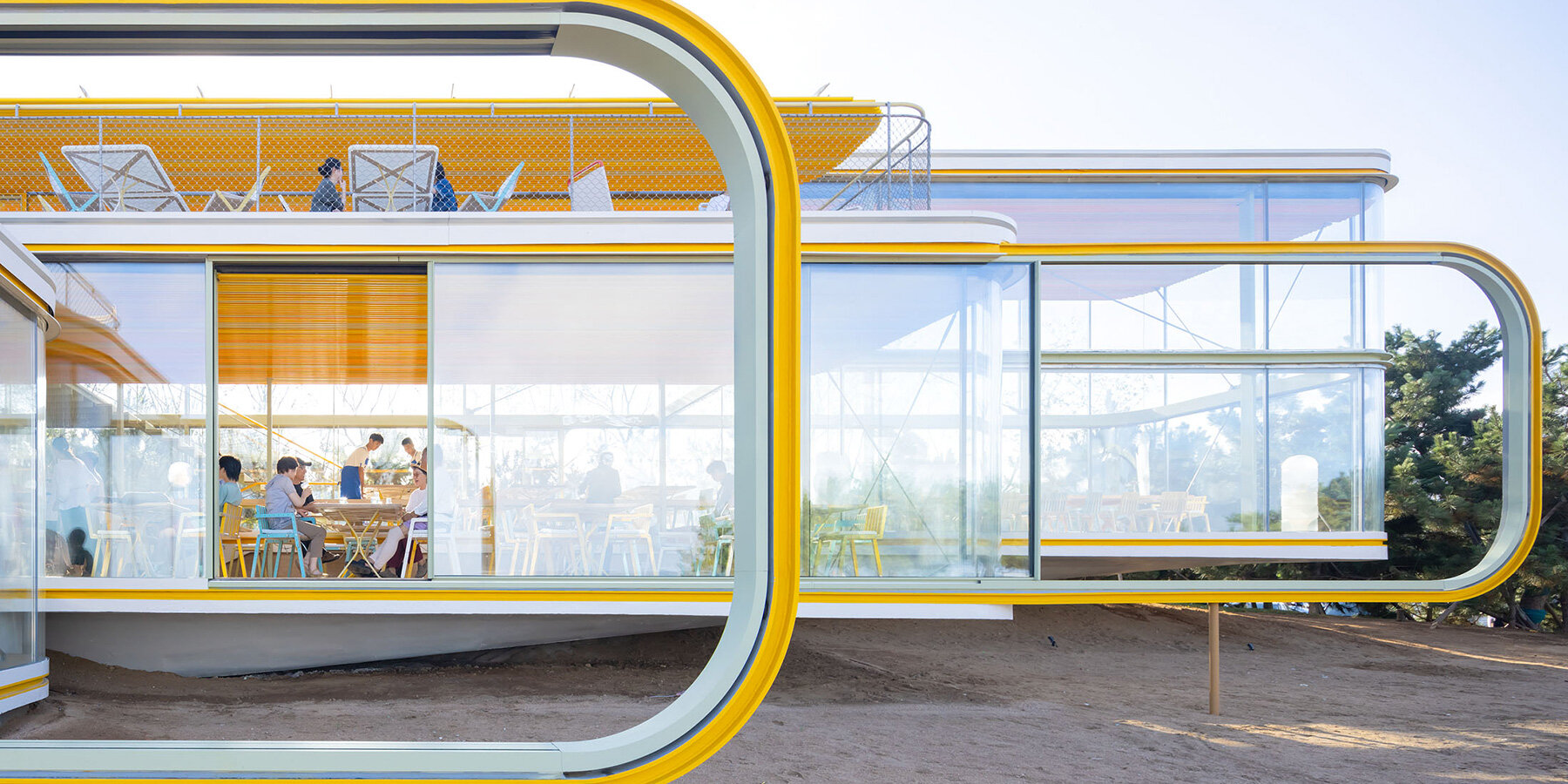 selgascano composes transparent seaside café from three parallel glass volumes in china