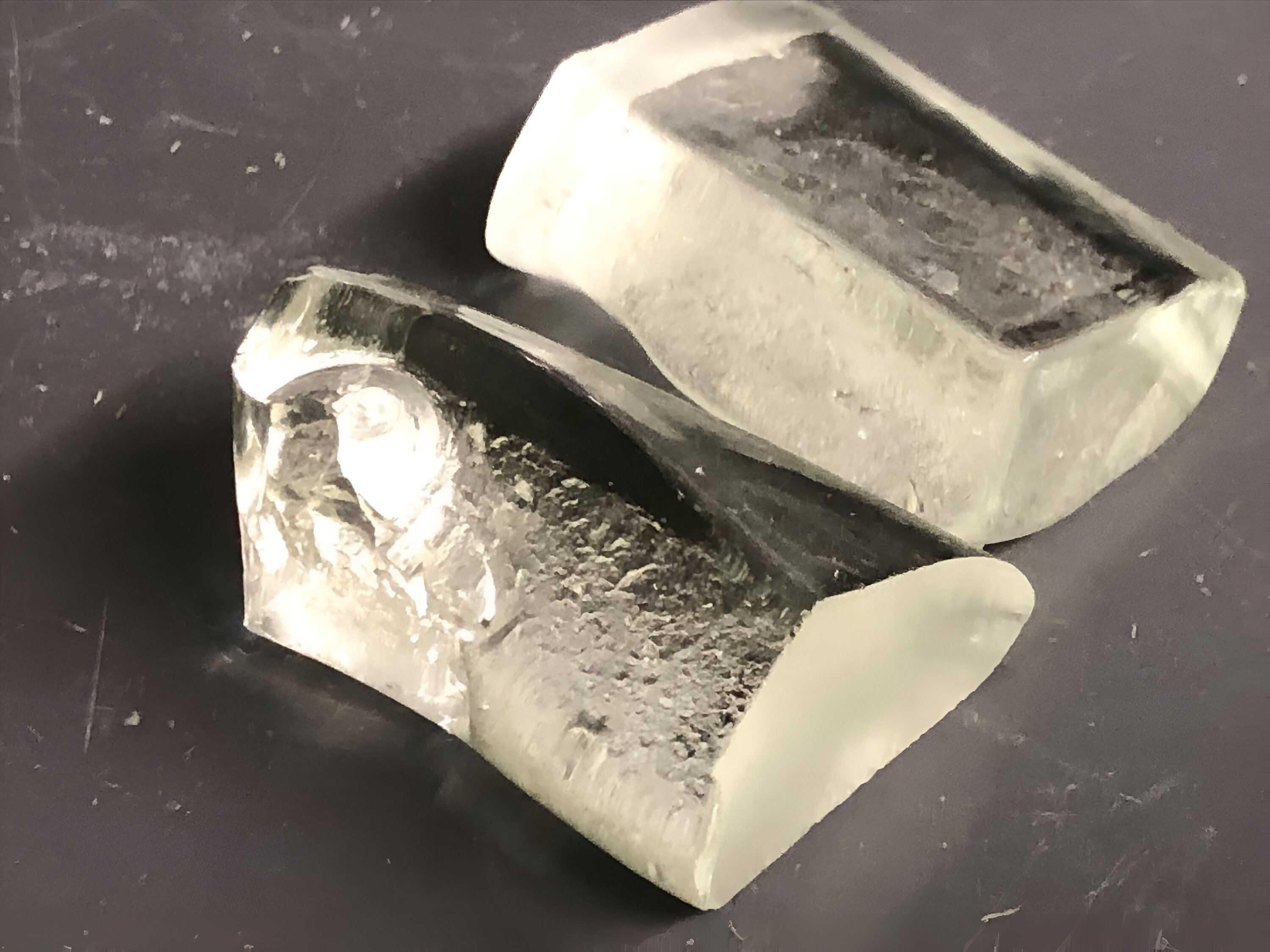LionGlass, a new family of glass developed by researchers at Penn State, requires significantly less energy to produce and is much more damage resistant than standard soda lime silicate glass. Credit: Penn State.
